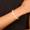 1005-mixed-metal-plated-half-flat-hinged-bangle-1.webp Mixed Metal Plated Half Flat Hinged Bangle