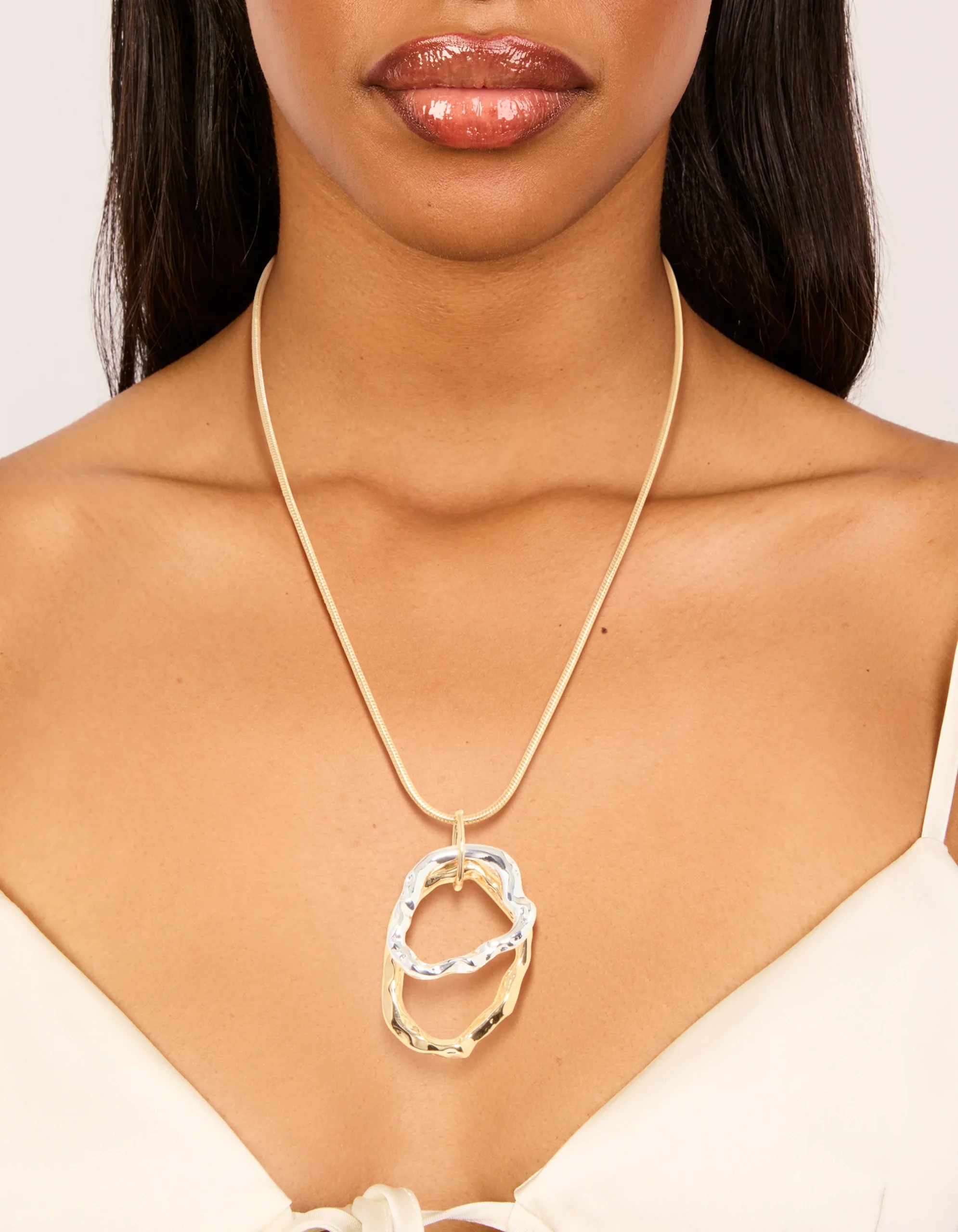 1012-mixed-metal-plated-textured-double-oval-pendant-necklace-1.webp Mixed Metal Plated Textured Double Oval Pendant Necklace