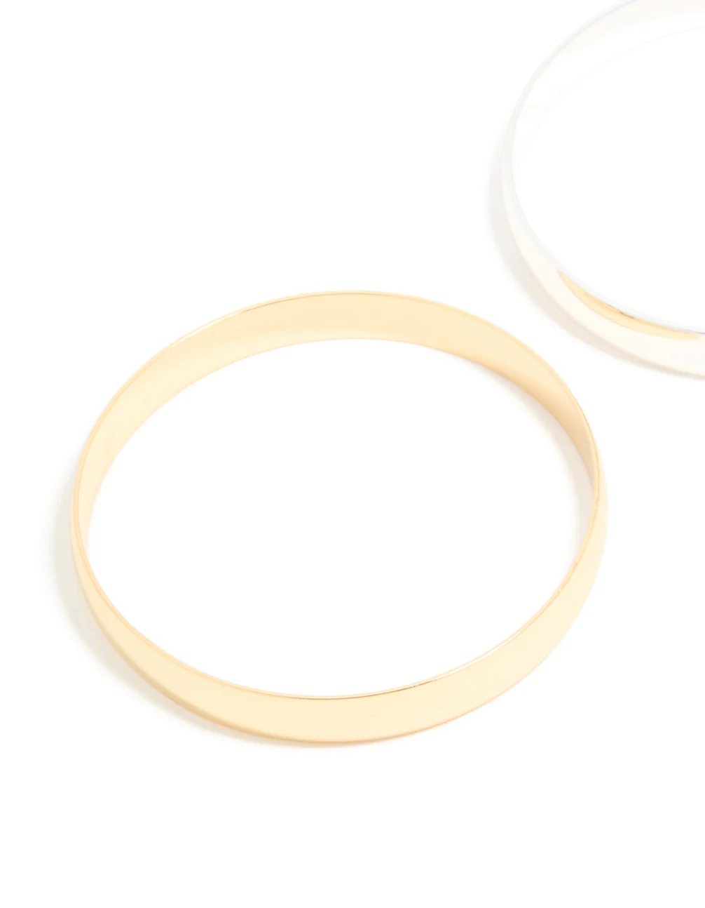 1015-mixed-metal-thick-classic-bangles-2-pack-2.webp Mixed Metal Thick Classic Bangles 2-Pack