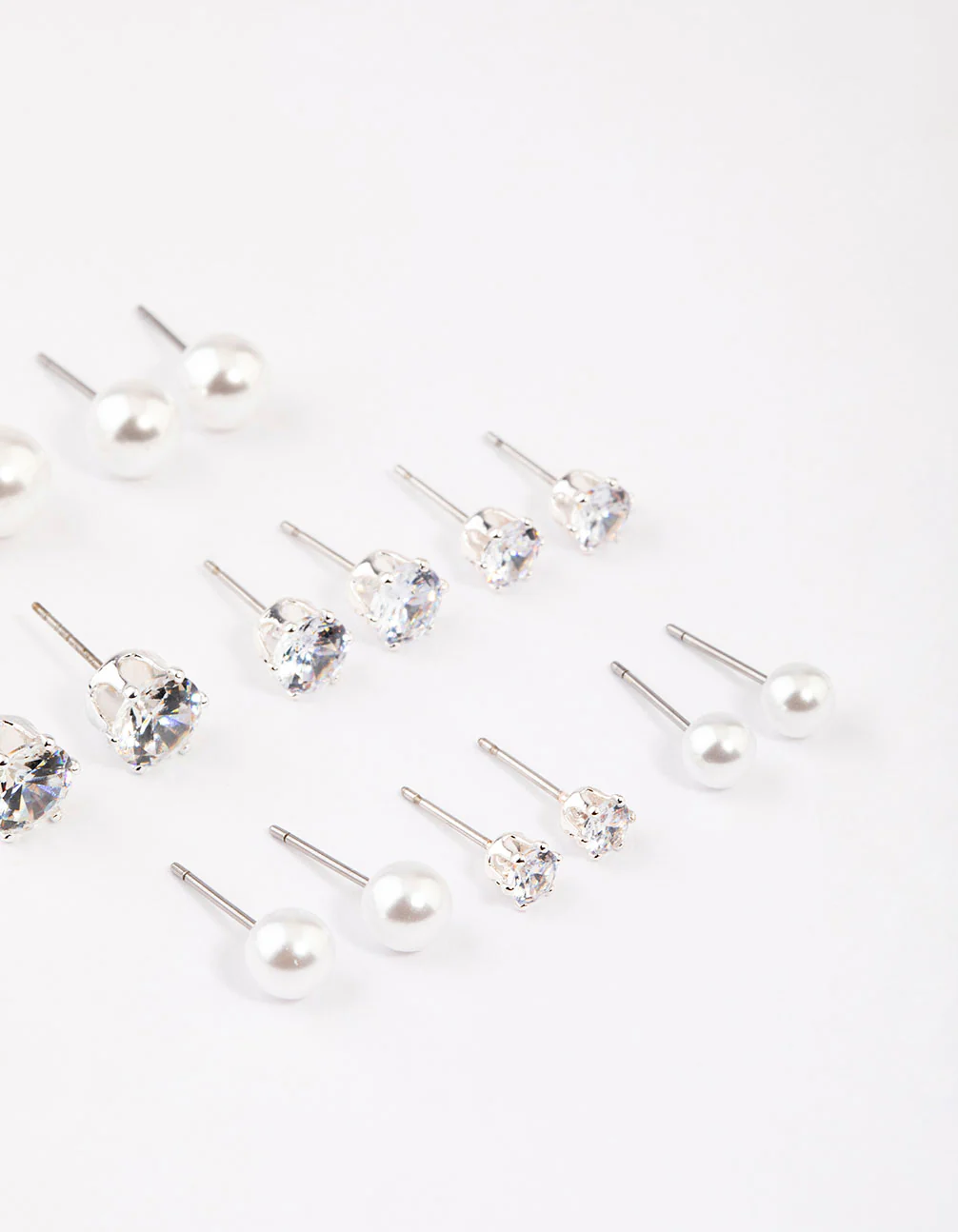 1073-silver-graduating-diamante-pearl-earrings-8-pack-2.webp Silver Graduating Diamante & Pearl Earrings 8-Pack