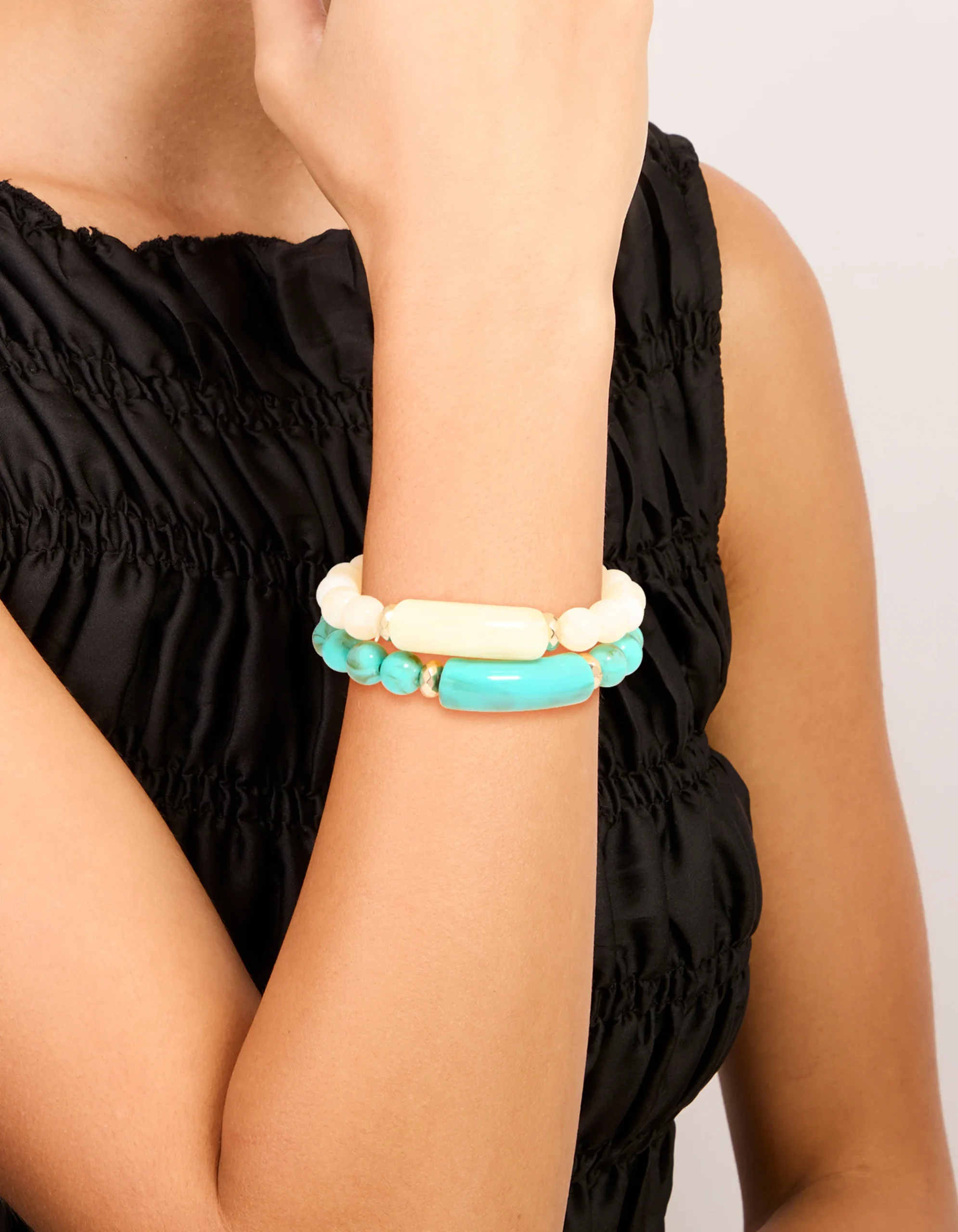 1126-turquoise-neutral-beaded-stretch-bracelets-2-pack-1.webp Turquoise & Neutral Beaded Stretch Bracelets 2-Pack
