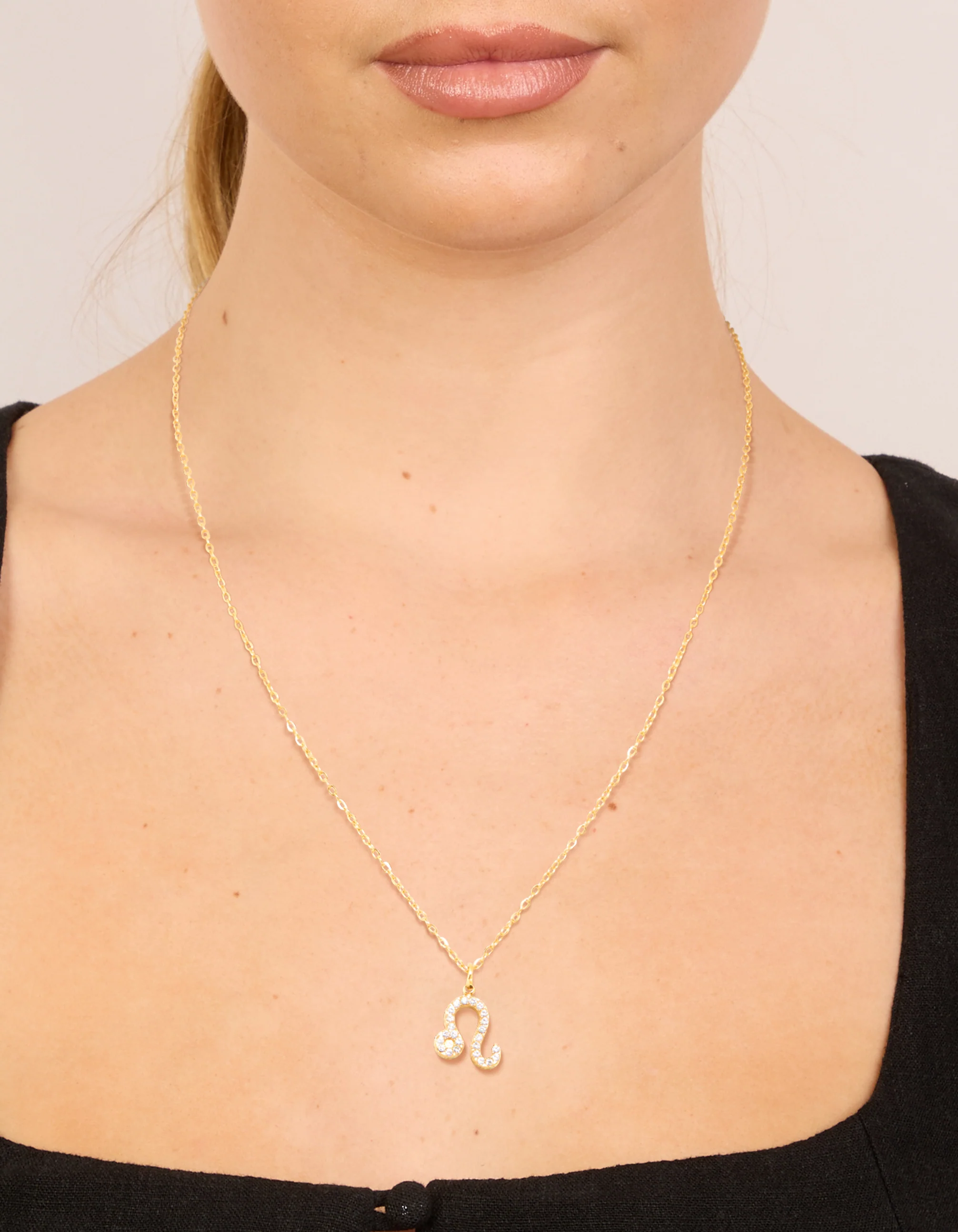 1141-waterproof-gold-plated-stainless-steel-cubic-zirconia-leo-zodiac-sign-necklace-2.webp Waterproof Gold Plated Stainless Steel Cubic Zirconia Leo Zodiac Sign Necklace