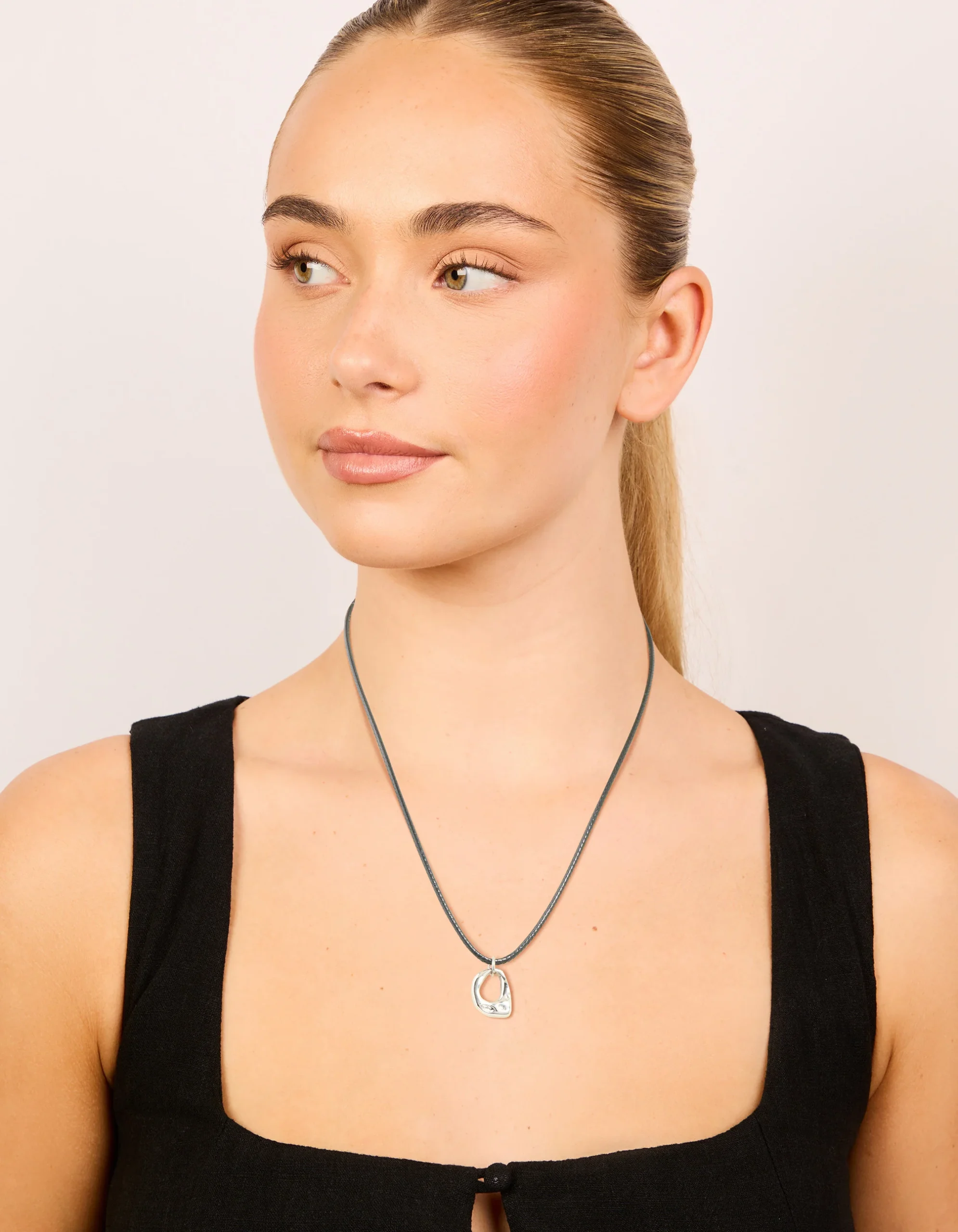 1208-waterproof-stainless-steel-small-pendant-cord-necklace-3.webp Waterproof Stainless Steel Small Pendant Cord Necklace