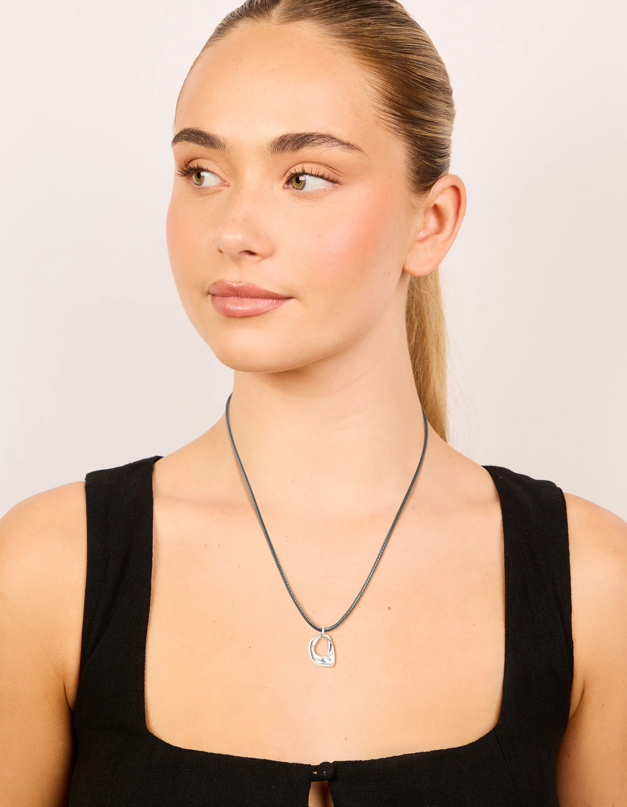 1208-waterproof-stainless-steel-small-pendant-cord-necklace-3.webp Waterproof Stainless Steel Small Pendant Cord Necklace