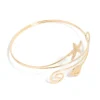 1306-gold-starfish-shell-arm-cuff-1.webp Gold Starfish & Shell Arm Cuff