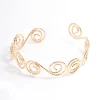 1314-gold-hammered-spiral-bangle-arm-cuff-1.webp Gold Hammered Spiral Bangle Arm Cuff
