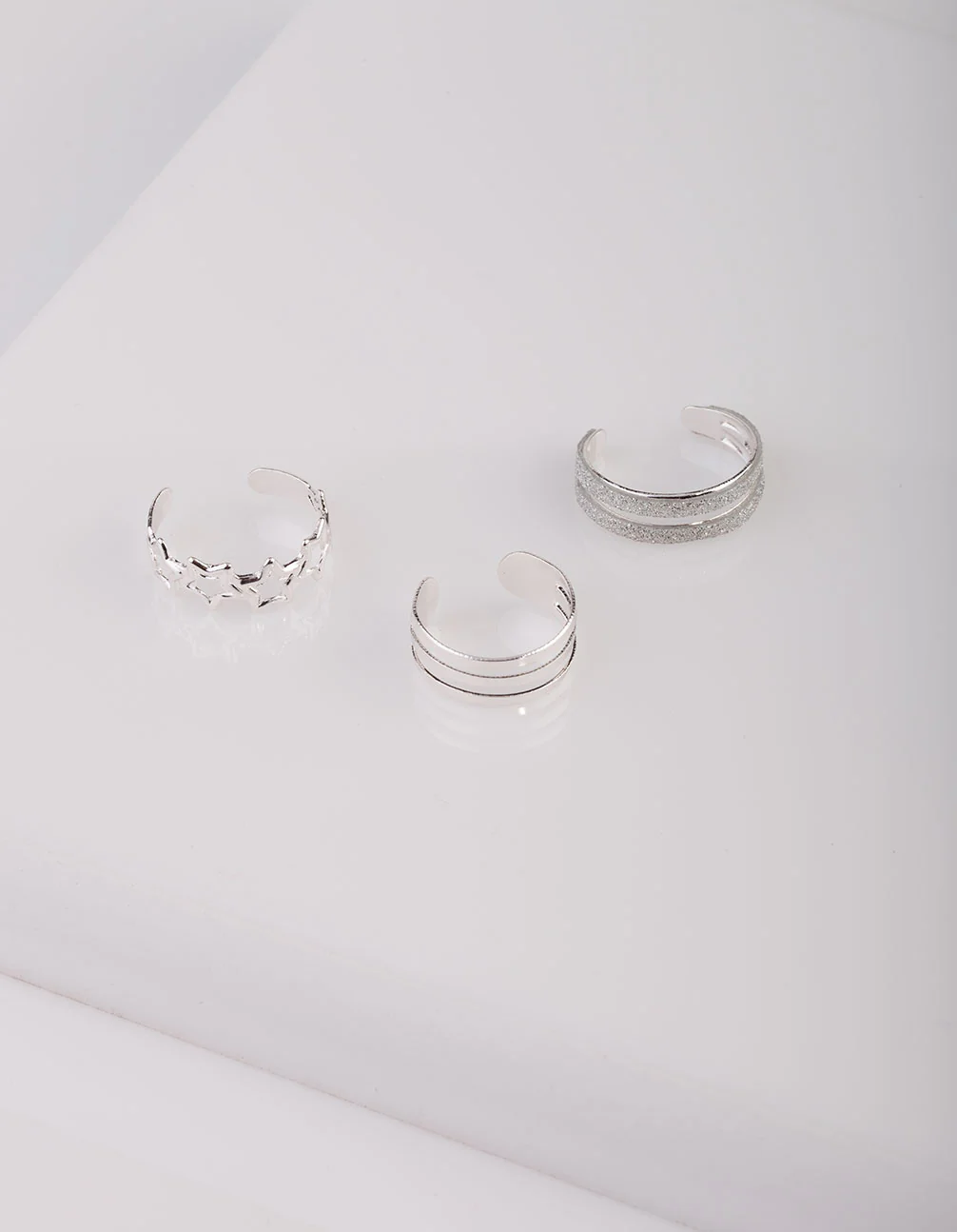 1350-silver-glitter-star-toe-ring-pack-2.webp Silver Glitter Star Toe Ring Pack