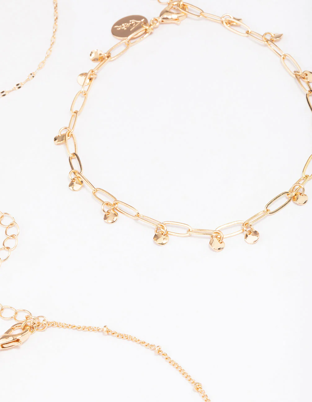 1353-gold-mixed-chain-anklet-4-pack-2.webp Gold Mixed Chain Anklet 4-Pack