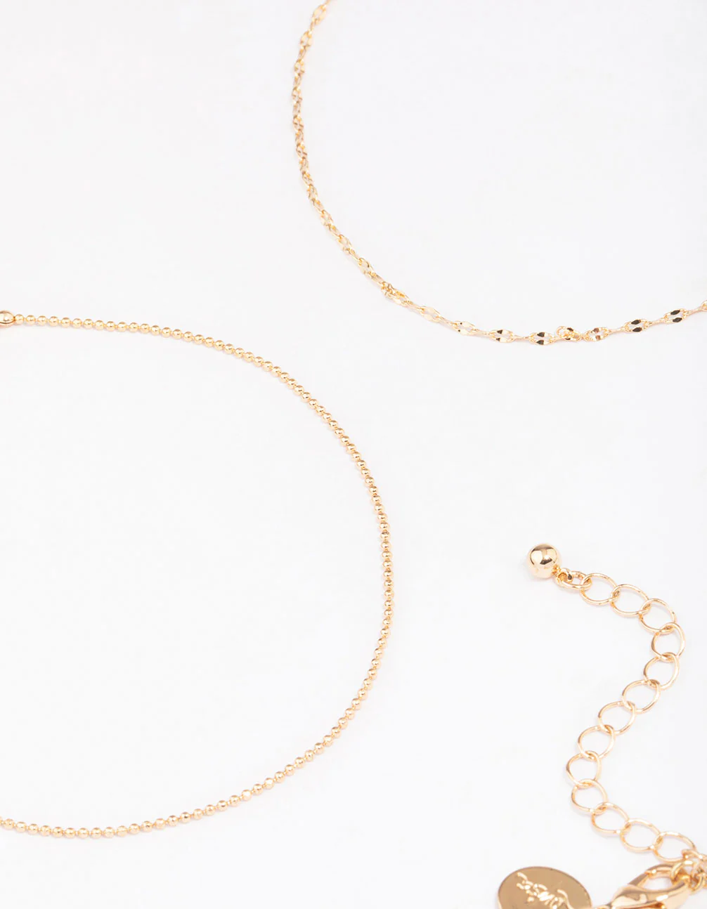 1353-gold-mixed-chain-anklet-4-pack-3.webp Gold Mixed Chain Anklet 4-Pack
