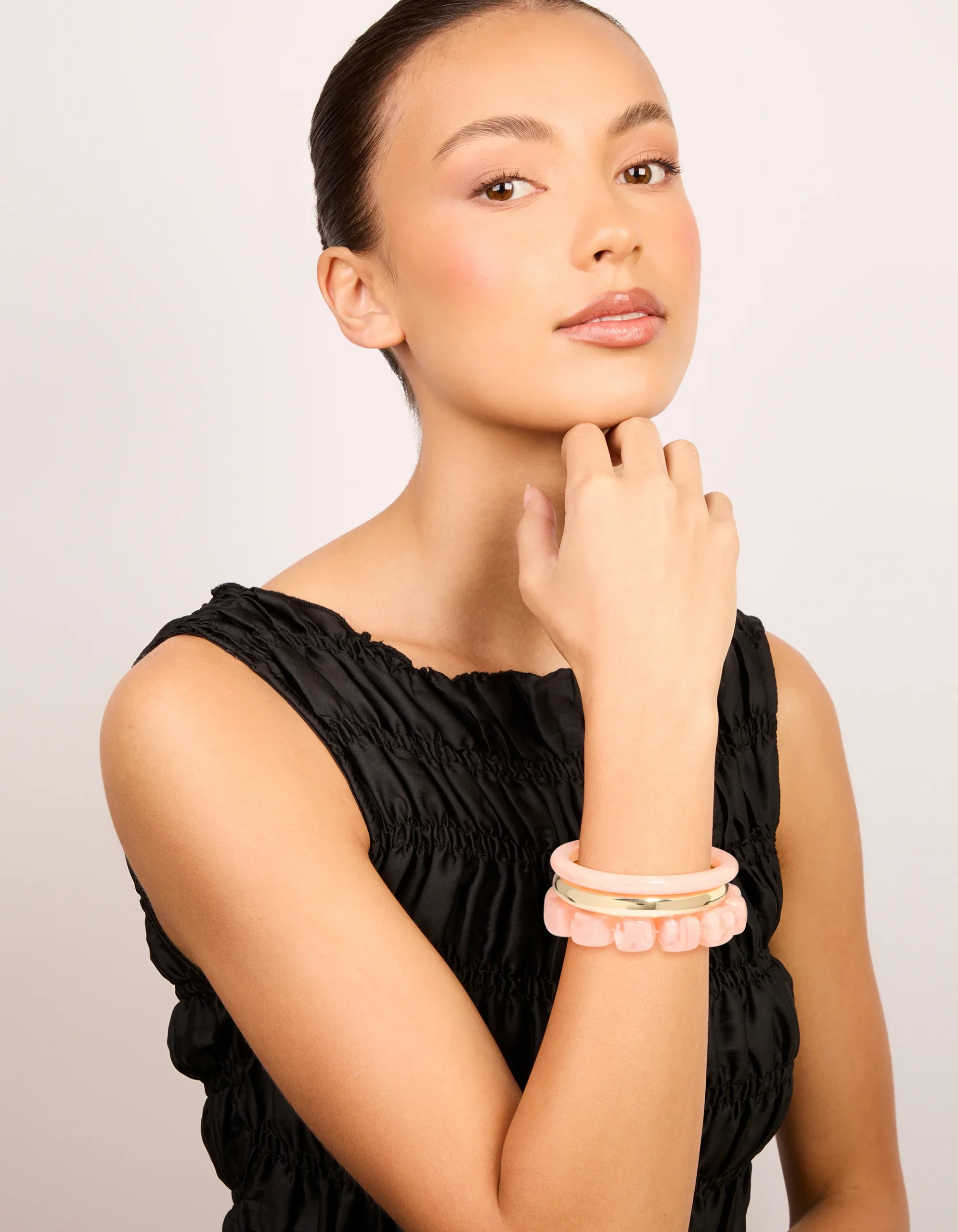 1416-pink-acrylic-gold-smooth-bracelets-3-pack-3.webp Pink Acrylic & Gold Smooth Bracelets 3-Pack
