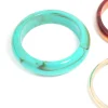 1432-aqua-blue-brown-acrylic-gold-bangles-3-pack-2.webp Aqua Blue Brown Acrylic & Gold Bangles 3-Pack