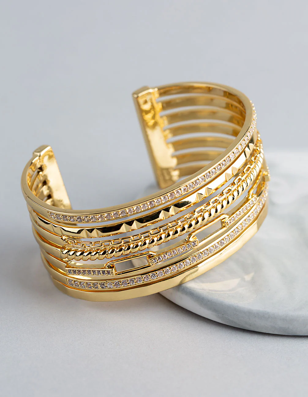 1509-18ct-gold-plated-brass-cubic-zirconia-multi-row-cuff-bracelet-1.webp 18ct Gold Plated Brass Cubic Zirconia Multi Row Cuff Bracelet