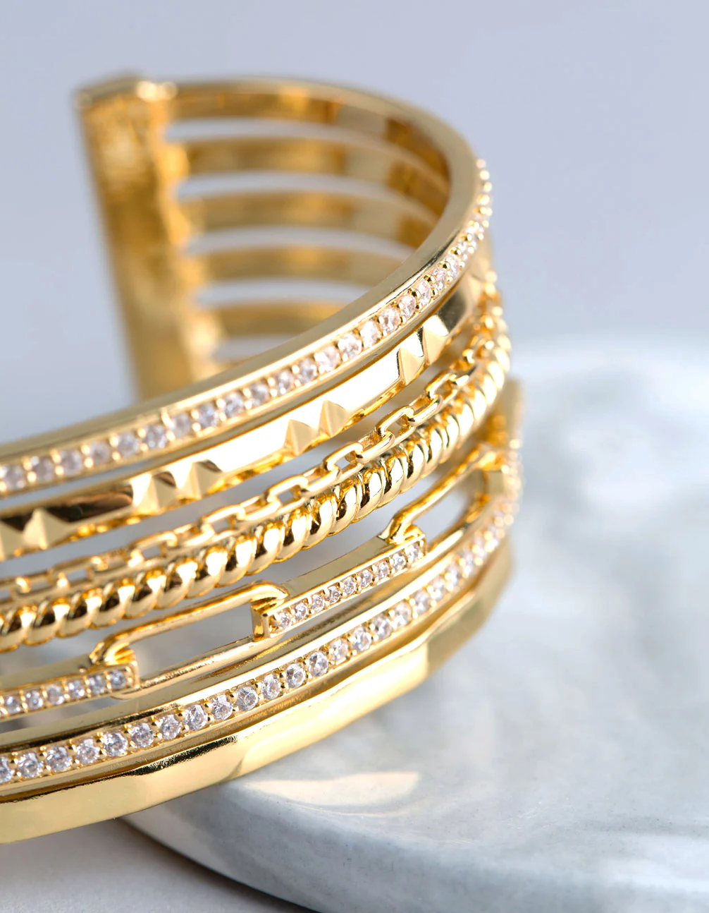 1509-18ct-gold-plated-brass-cubic-zirconia-multi-row-cuff-bracelet-2.webp 18ct Gold Plated Brass Cubic Zirconia Multi Row Cuff Bracelet
