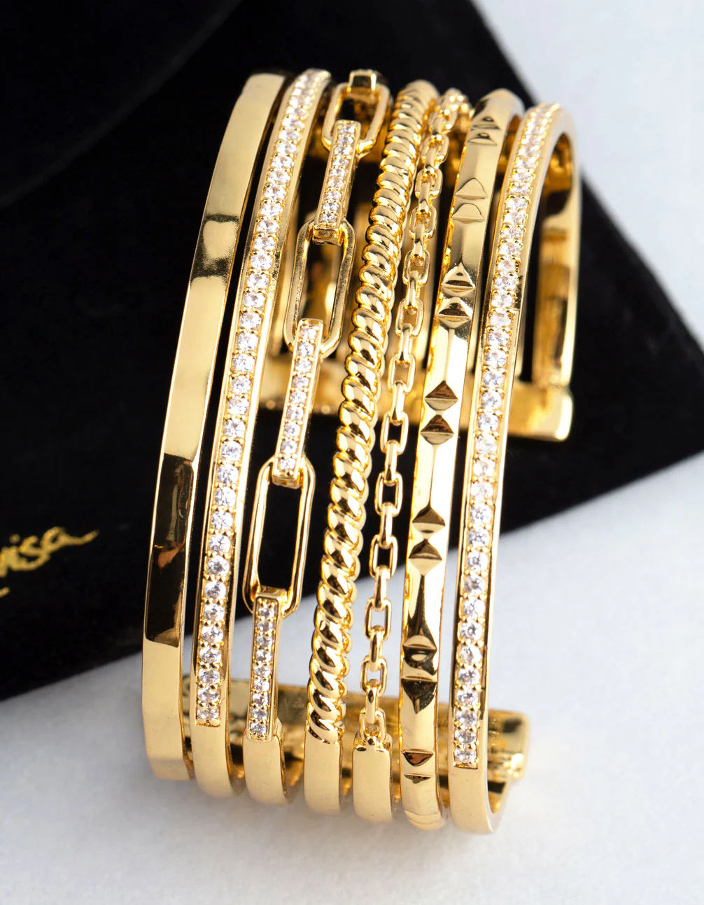 1509-18ct-gold-plated-brass-cubic-zirconia-multi-row-cuff-bracelet-4.webp 18ct Gold Plated Brass Cubic Zirconia Multi Row Cuff Bracelet
