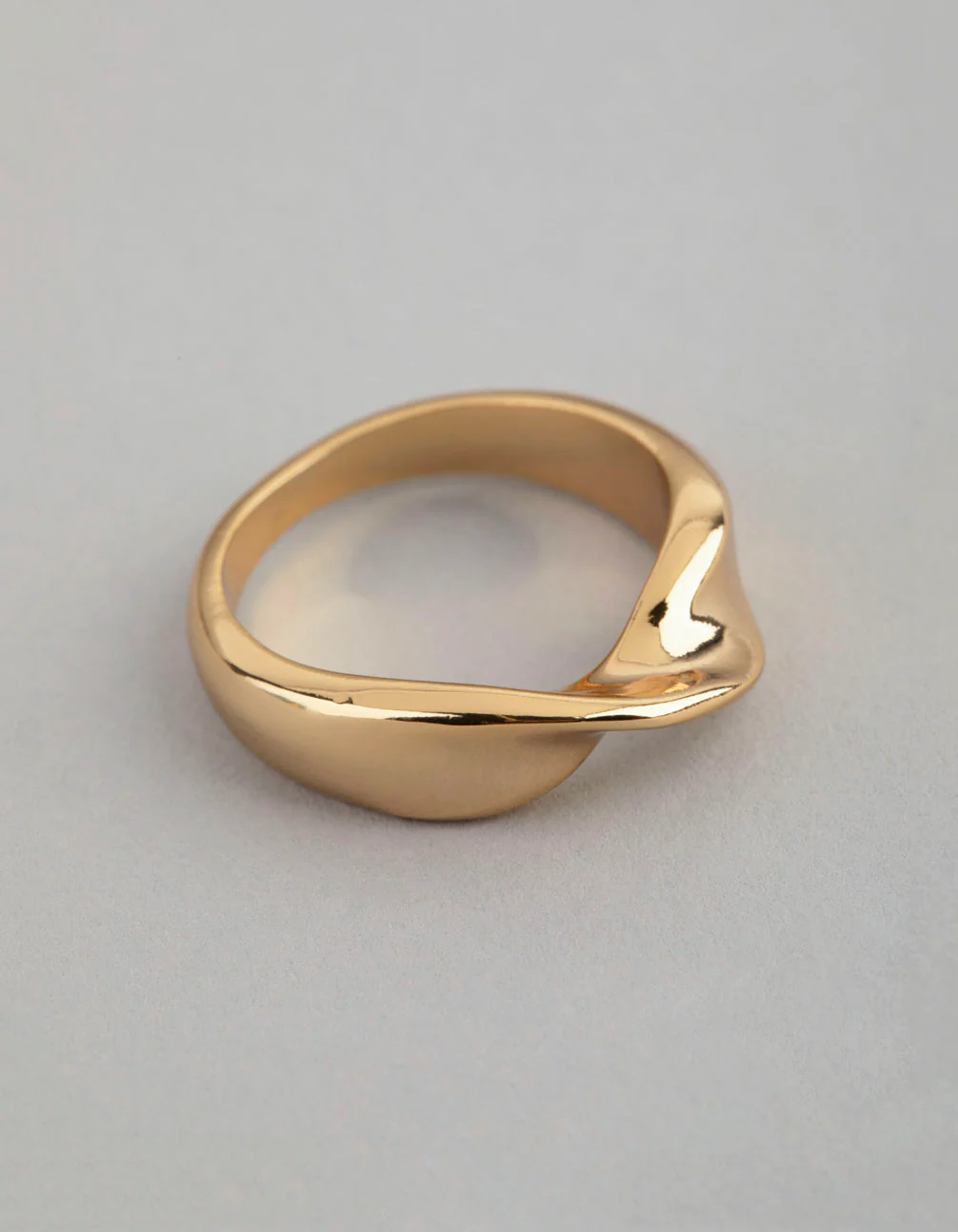 1540-18ct-gold-plated-brass-twisted-ring-1.webp 18ct Gold Plated Brass Twisted Ring