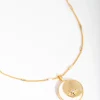 1541-18ct-gold-plated-cubic-zirconia-shell-moon-necklace-1.webp 18ct Gold Plated Cubic Zirconia & Shell Moon Necklace
