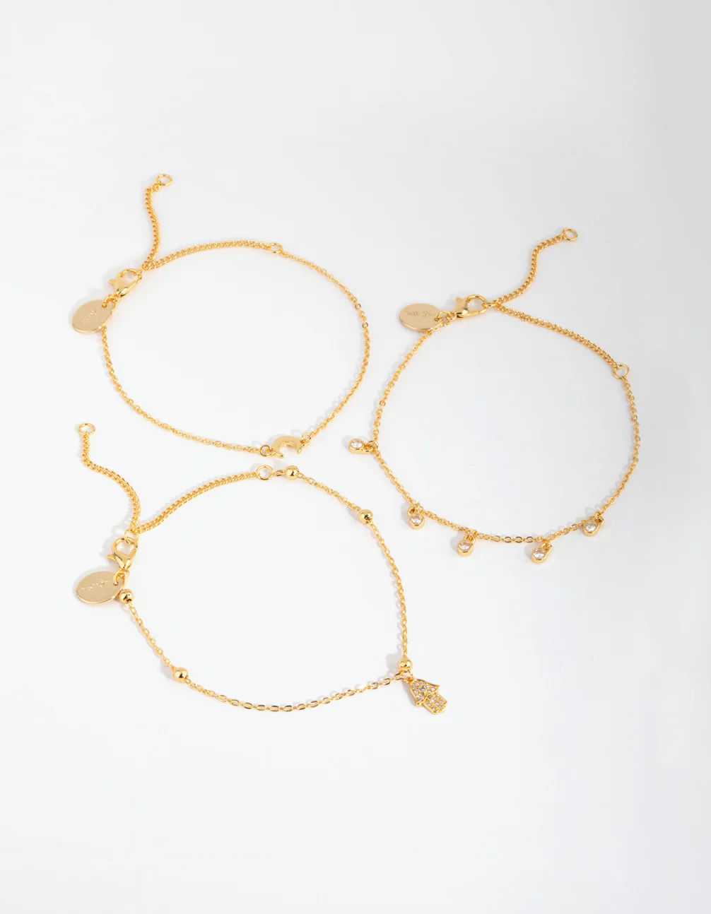 1542-18ct-gold-plated-cubic-zirconia-hamsa-moon-bracelet-set-1.webp 18ct Gold Plated Cubic Zirconia Hamsa & Moon Bracelet Set