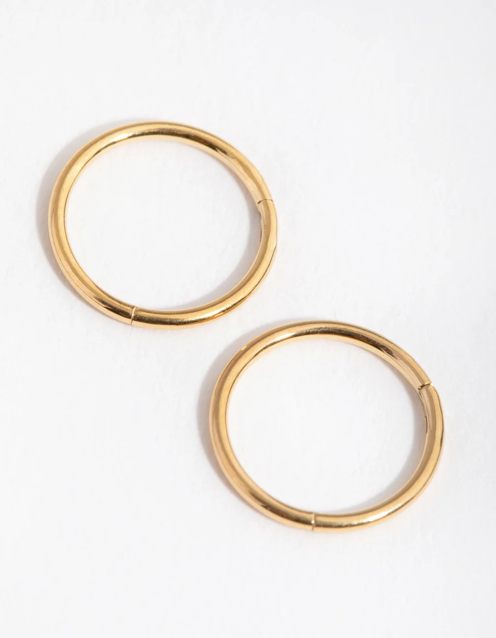 1550-24-carat-gold-plated-surgical-steel-8mm-sleeper-earrings-1.webp 24 Carat Gold Plated Surgical Steel 8mm Sleeper Earrings