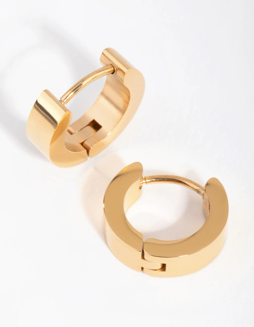 1562-24-carat-gold-plated-surgical-steel-wide-huggie-earrings-1.webp 24 Carat Gold Plated Surgical Steel Wide Huggie Earrings