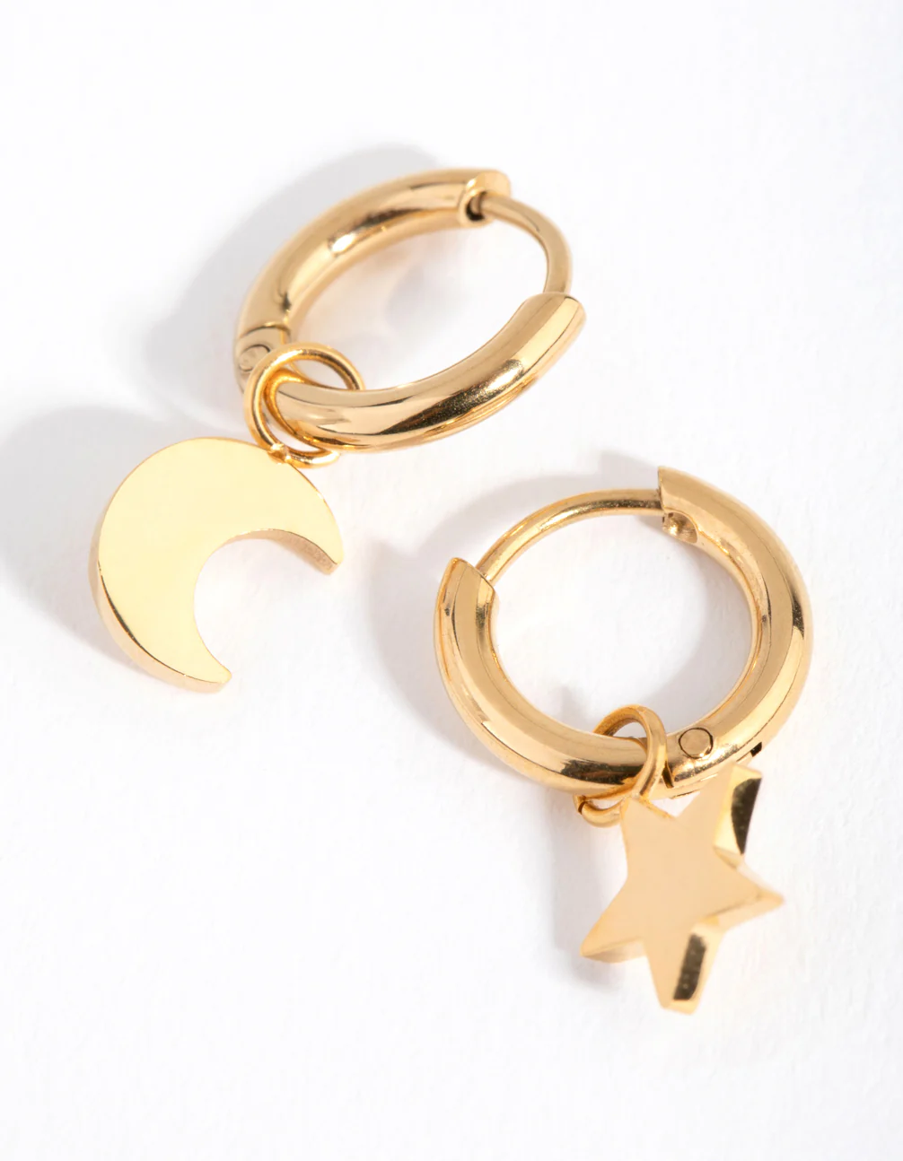 1564-24-carat-gold-plated-titanium-star-moon-huggie-earrings-1.webp 24 Carat Gold Plated Titanium Star & Moon Huggie Earrings