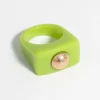 1592-90s-green-gold-plastic-ring-1.webp 90s Green & Gold Plastic Ring