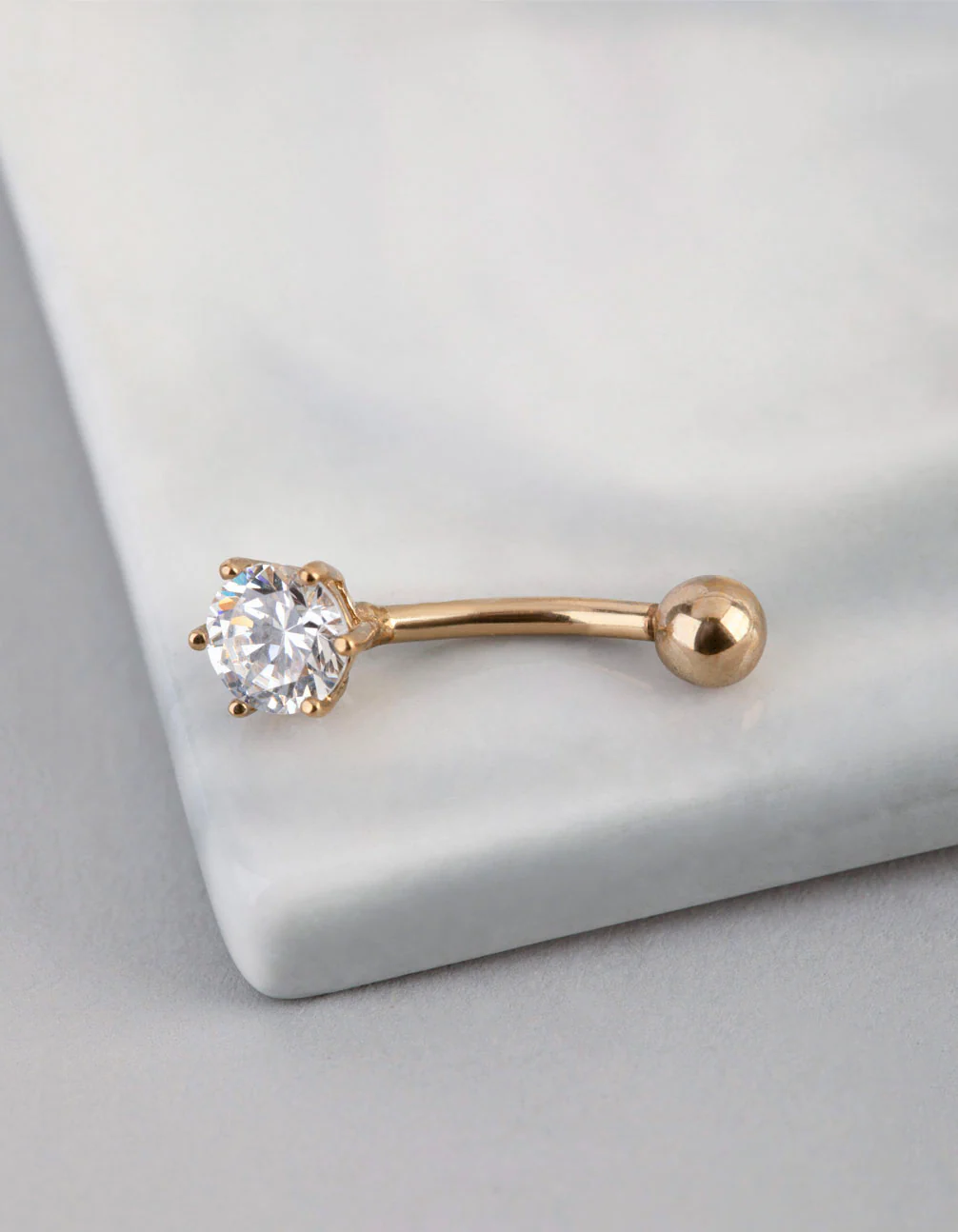 1613-9ct-gold-6mm-cubic-zirconia-belly-ring-1.webp 9ct Gold 6mm Cubic Zirconia Belly Ring