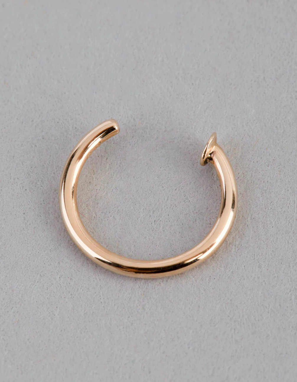 1627-9ct-gold-mini-nail-open-nose-ring-2.webp 9ct Gold Mini Nail Open Nose Ring