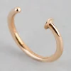 1627-9ct-gold-mini-nail-open-nose-ring-3.webp 9ct Gold Mini Nail Open Nose Ring