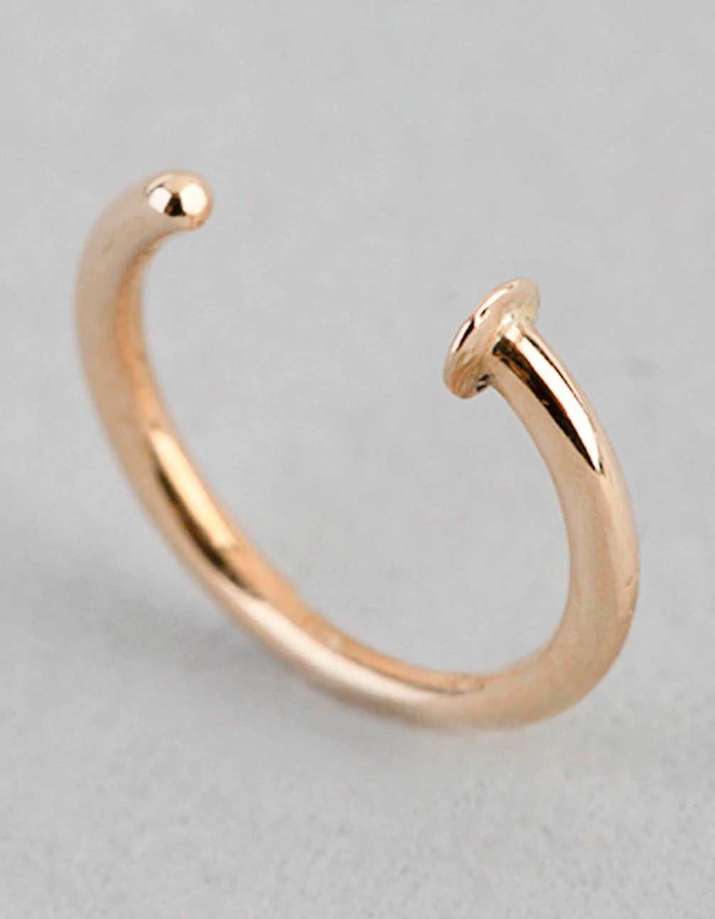 1627-9ct-gold-mini-nail-open-nose-ring-3.webp 9ct Gold Mini Nail Open Nose Ring