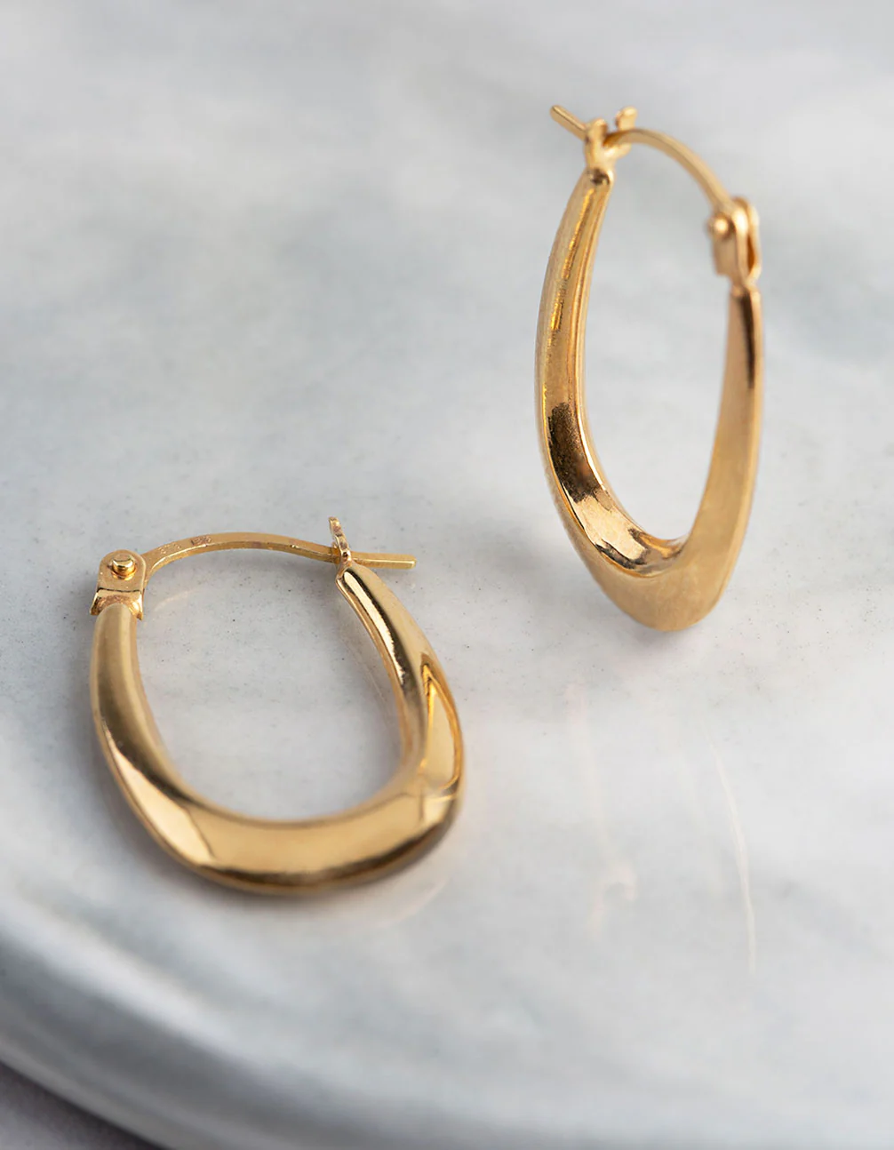 1633-9ct-gold-polished-oval-creole-hoop-earrings-1.webp 9ct Gold Polished Oval Creole Hoop Earrings