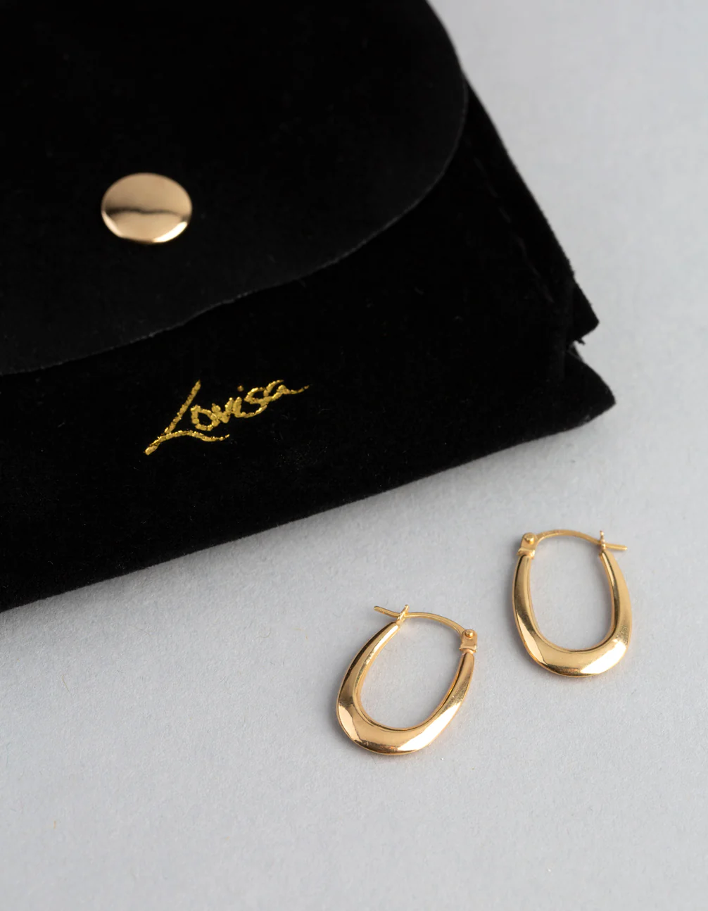 1633-9ct-gold-polished-oval-creole-hoop-earrings-4.webp 9ct Gold Polished Oval Creole Hoop Earrings