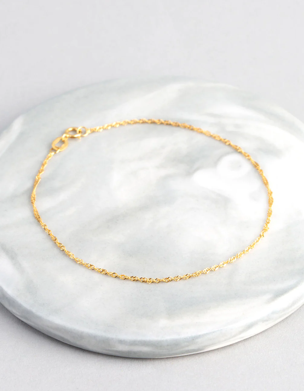 1637-9ct-gold-twist-curb-chain-bracelet-1.webp 9ct Gold Twist Curb Chain Bracelet