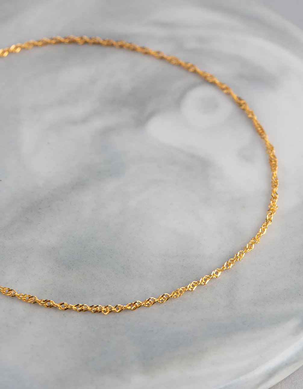 1637-9ct-gold-twist-curb-chain-bracelet-2.webp 9ct Gold Twist Curb Chain Bracelet