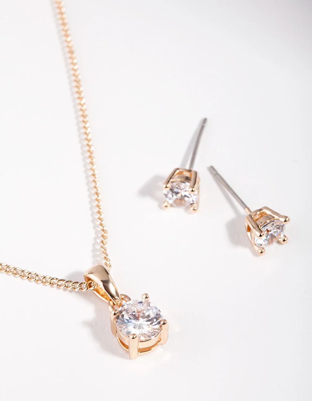 185-diamond-simulant-gold-stone-earrings-necklace-set-2.webp Diamond Simulant Gold Stone Earrings Necklace Set