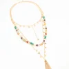 189-gold-beaded-tassel-layered-necklace-2.webp Gold Beaded Tassel Layered Necklace