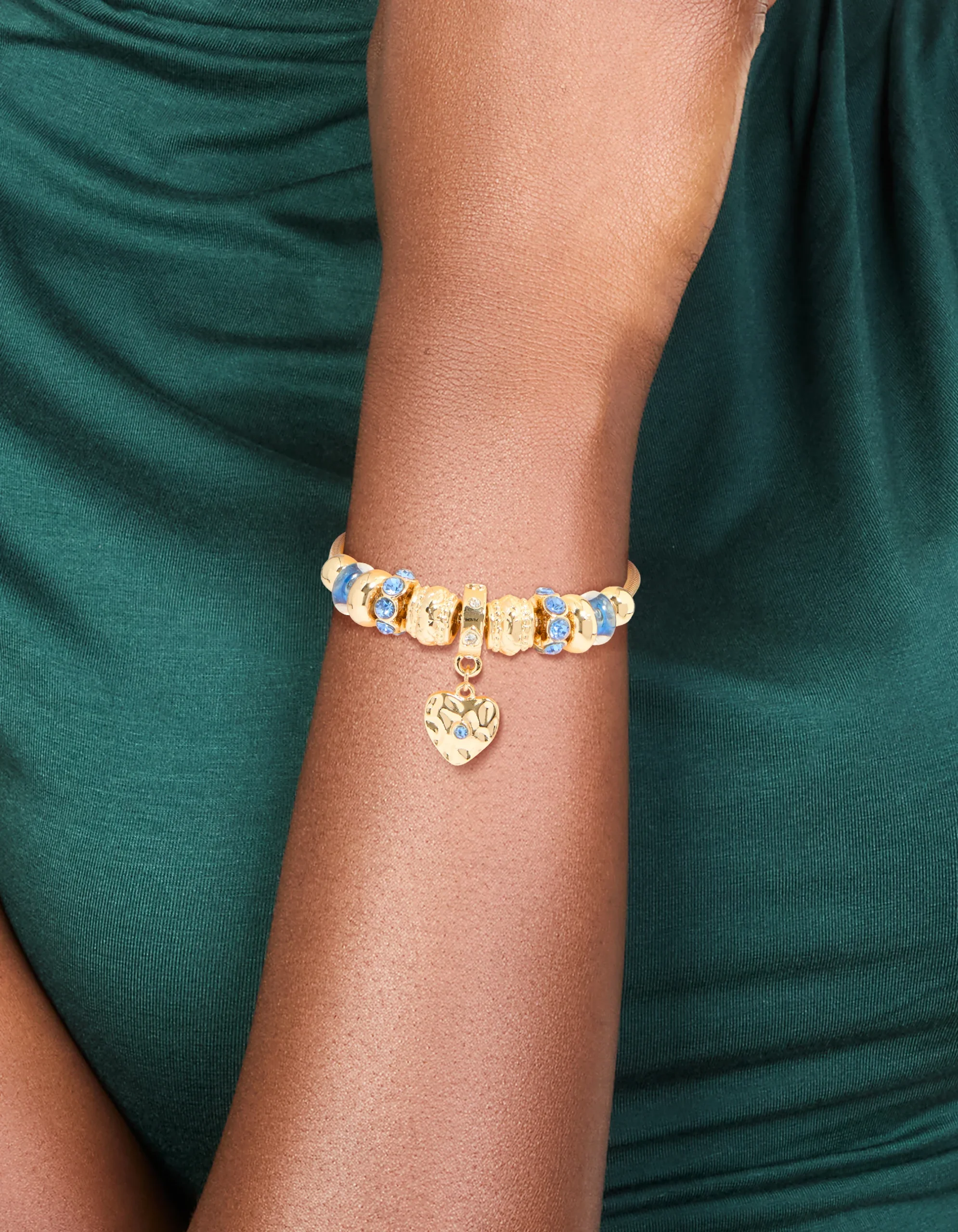 193-gold-blue-diamante-molten-heart-charm-toggle-bracelet-1.webp Gold Blue Diamante & Molten Heart Charm Toggle Bracelet