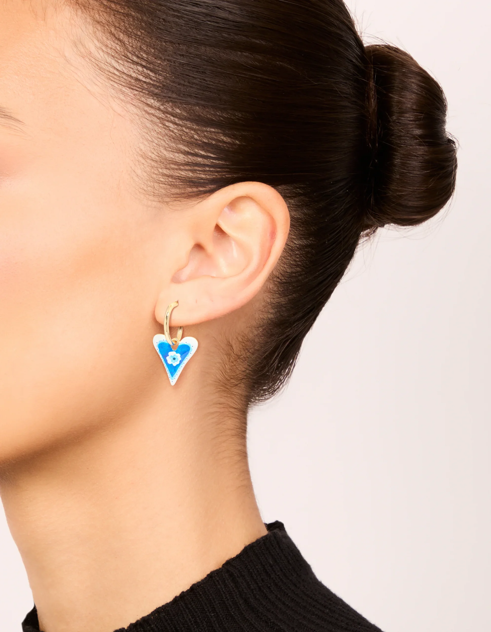 197-gold-blue-heart-with-a-flower-inside-huggie-earrings-1.webp Gold Blue Heart With A Flower Inside Huggie Earrings