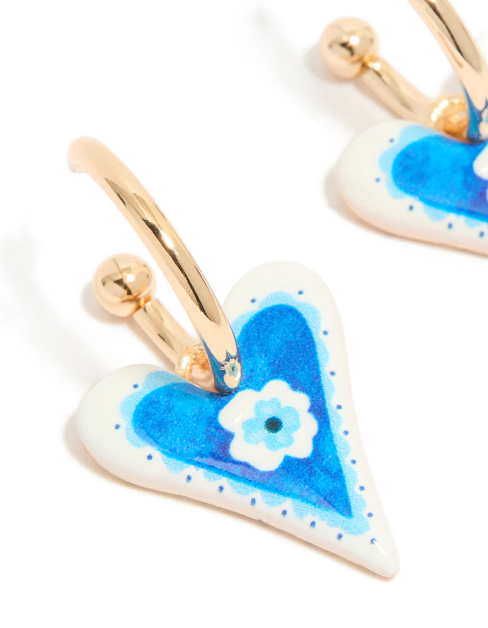 197-gold-blue-heart-with-a-flower-inside-huggie-earrings-4.webp Gold Blue Heart With A Flower Inside Huggie Earrings