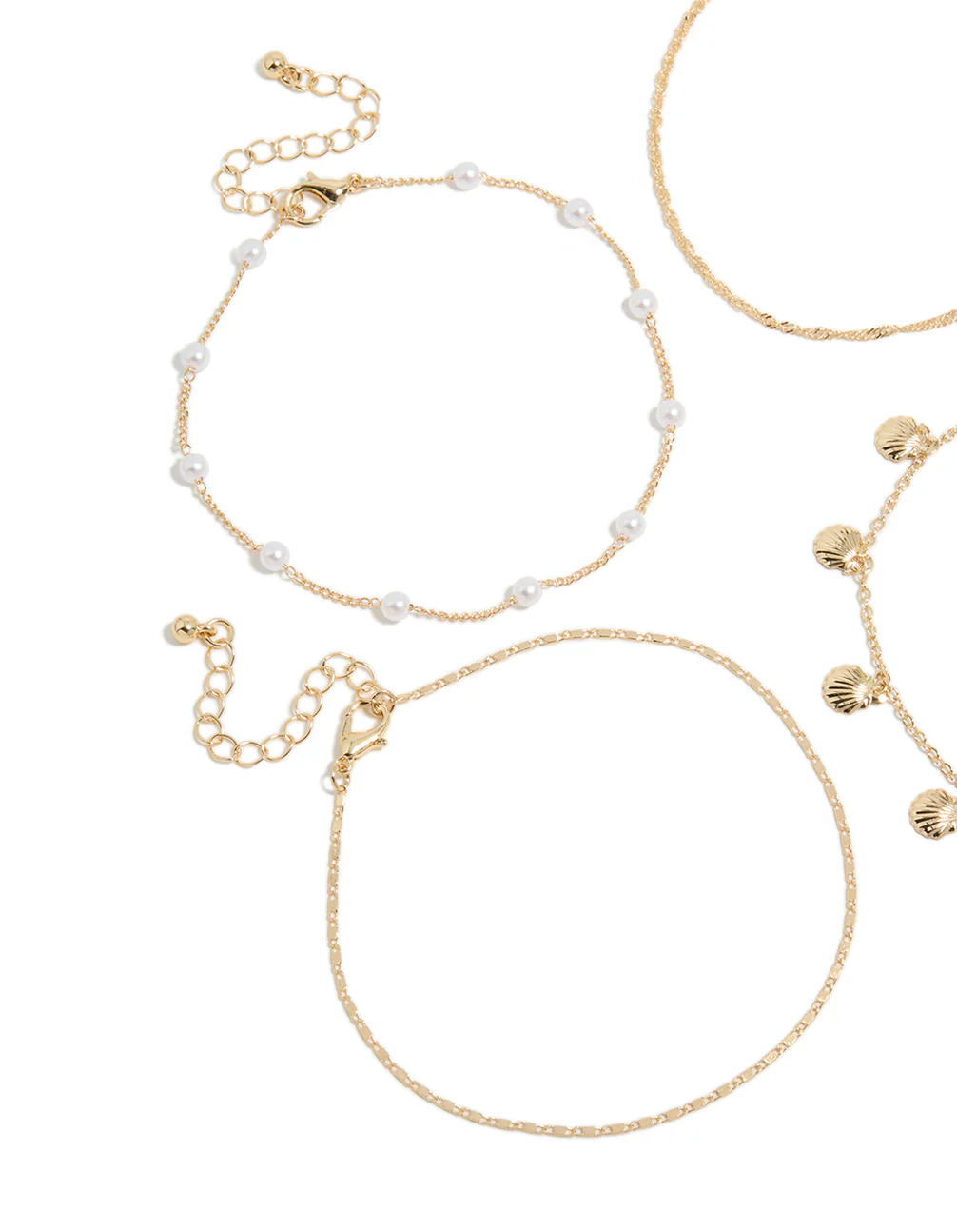 2-gold-shell-pearl-anklets-4-pack-2.webp Gold Shell & Pearl Anklets 4-Pack