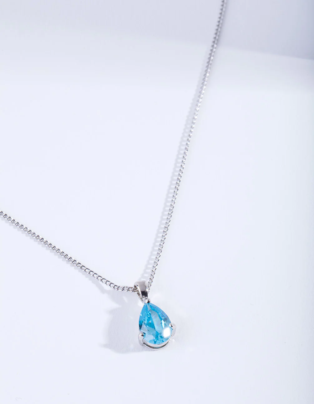 2022-aqua-pear-crystal-necklace-3.webp Aqua Pear Crystal Necklace