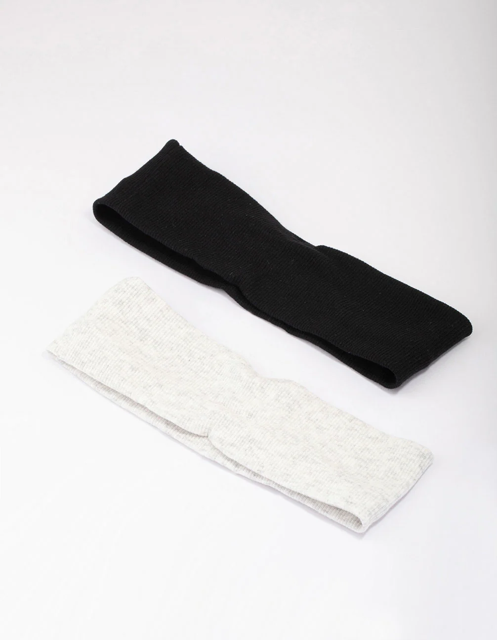 2077-black-grey-ribbed-fabric-headbands-2-pack-1.webp Black & Grey Ribbed Fabric Headbands 2-Pack
