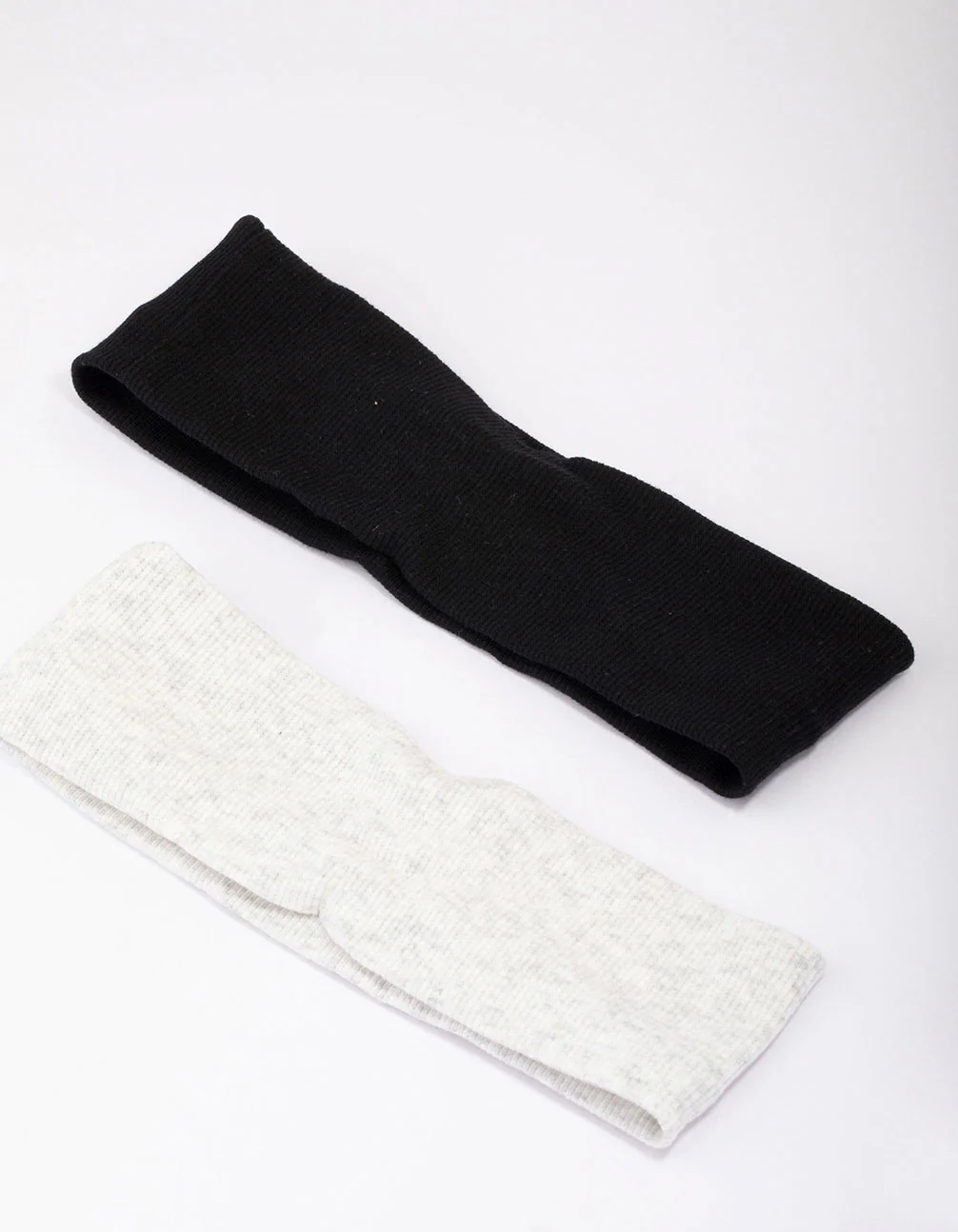 2077-black-grey-ribbed-fabric-headbands-2-pack-3.webp Black & Grey Ribbed Fabric Headbands 2-Pack