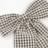 2089-black-white-gingham-fabric-medium-bow-clip-2.webp Black & White Gingham Fabric Medium Bow Clip