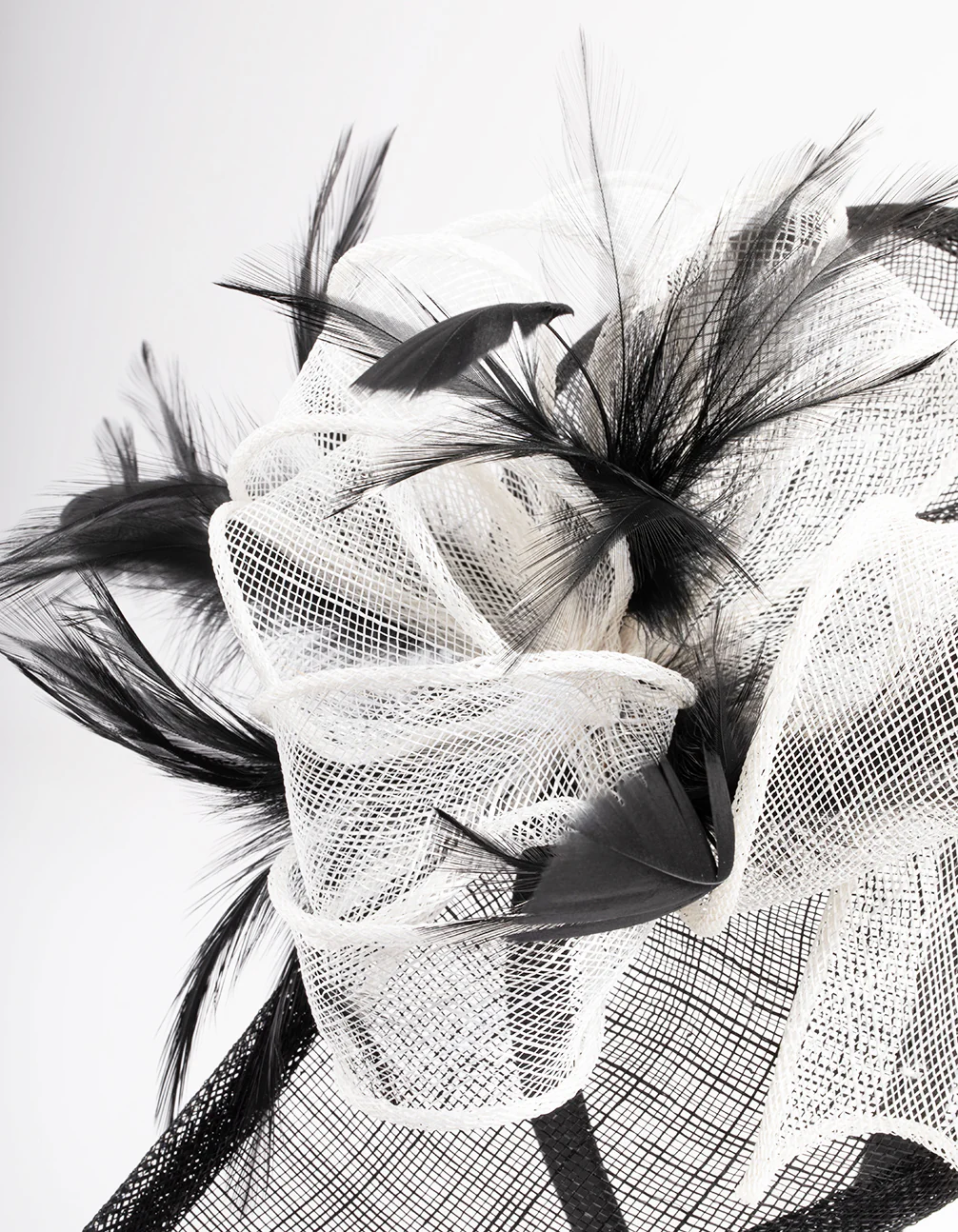 2095-black-white-sinamay-feathered-fascinator-3.webp Black & White Sinamay Feathered Fascinator