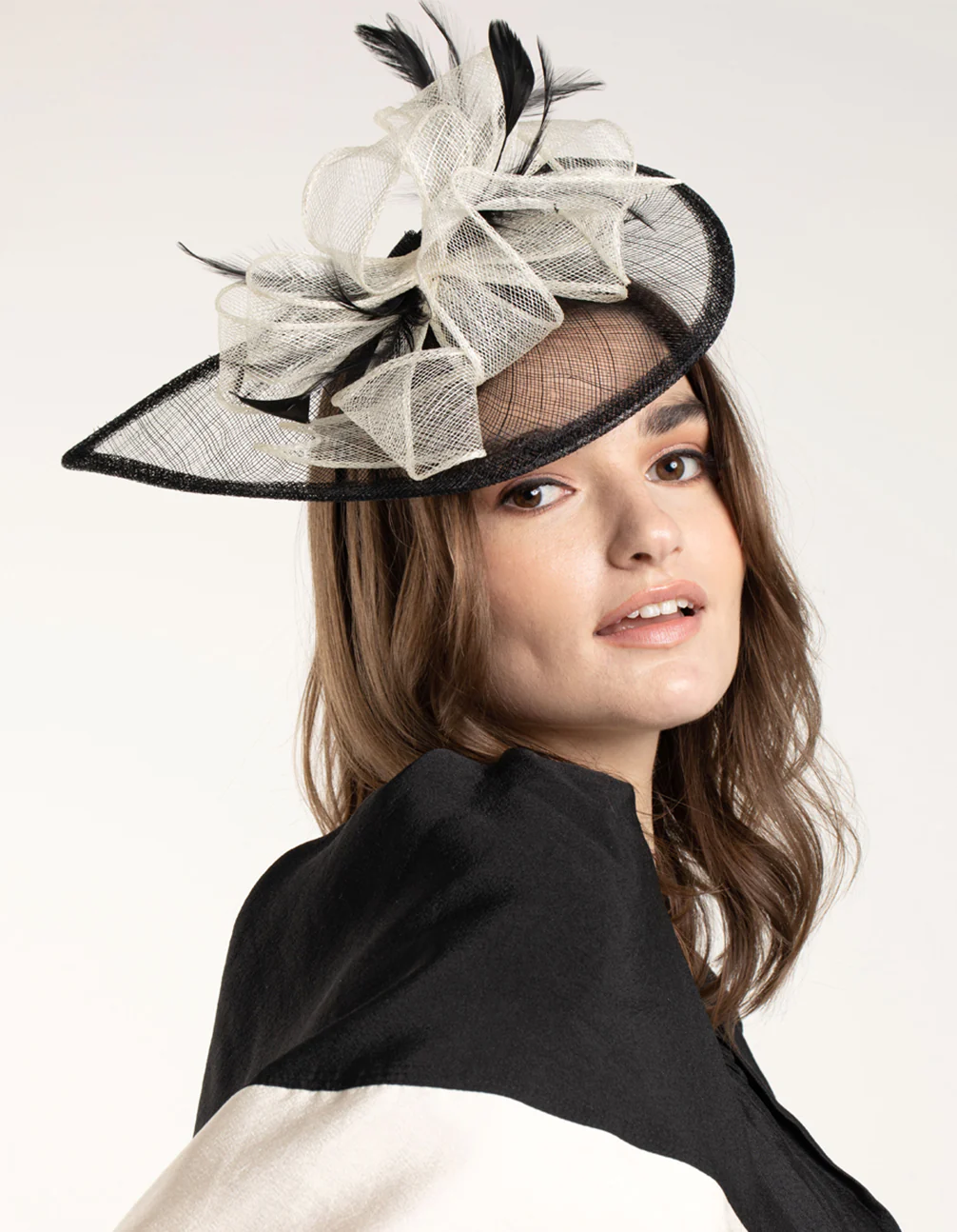 2095-black-white-sinamay-feathered-fascinator-5.webp Black & White Sinamay Feathered Fascinator