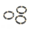 2103-black-acrylic-stretch-bracelets-3-pack-1.webp Black Acrylic Stretch Bracelets 3-Pack