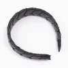 2128-black-braided-padded-headband-3.webp Black Braided Padded Headband