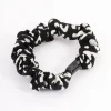 2144-black-clamp-thin-scrunchie-1.webp Black Clamp Thin Scrunchie