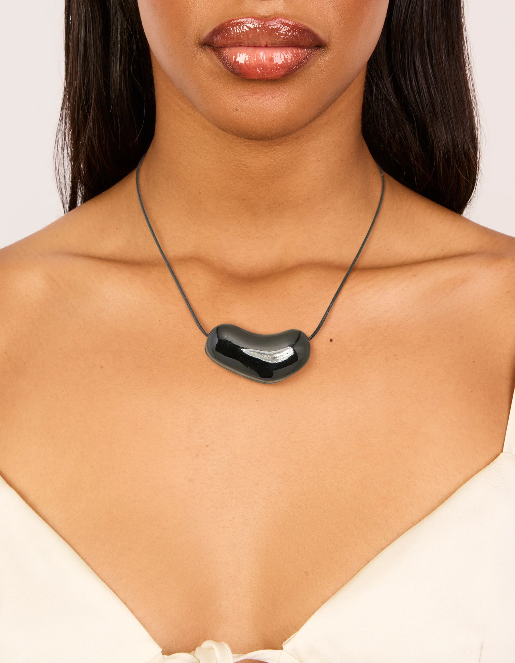 2159-black-coated-metal-baby-pebble-orb-cord-necklace-2.webp Black Coated Metal Baby Pebble Orb Cord Necklace
