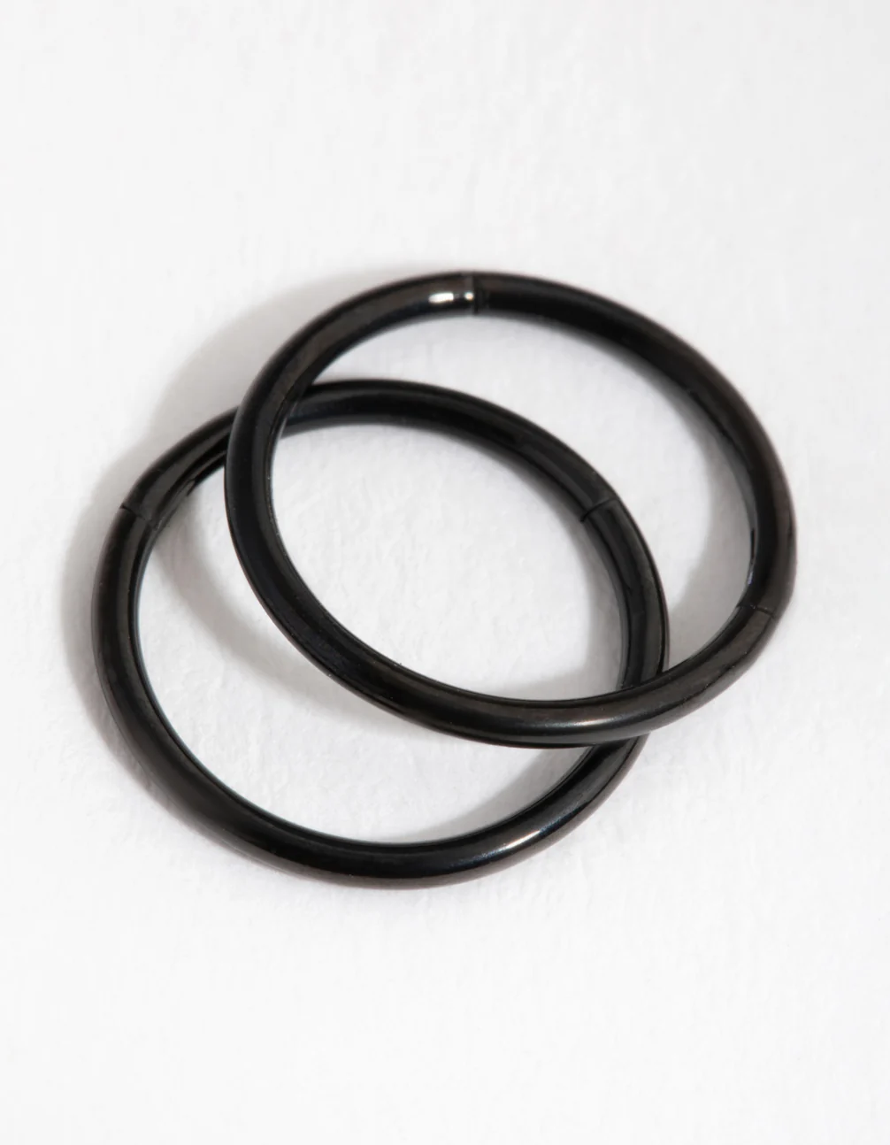 2182-black-coated-metal-surgical-steel-8mm-sleeper-earrings-3.webp Black Coated Metal Surgical Steel 8mm Sleeper Earrings
